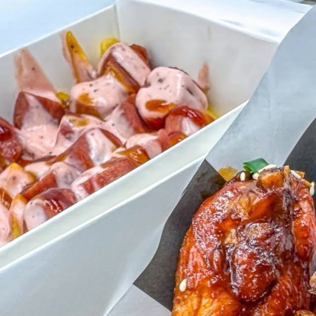 Sausage loaded fries and BBQ wings at Tatli